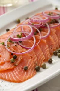 Smoked Salmon Carpaccio with Fried Capers and Herbs