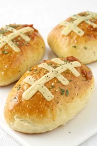 Football-Shaped Cheesy Stuffed Garlic Bread Rolls Recipe