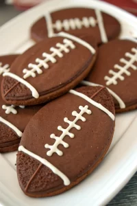 Super Bowl Chocolate Football Cookies with a Cream Cheese Frosting Dip